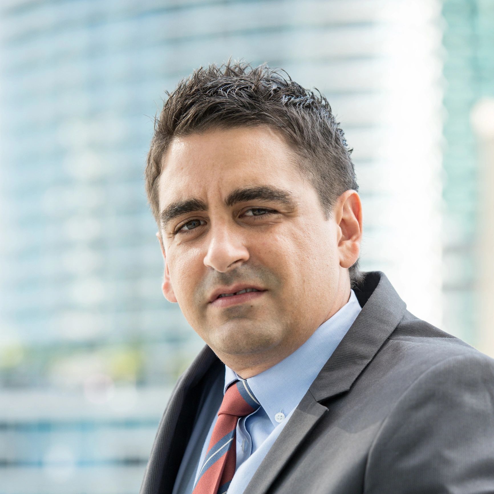 Portrait of operations director testimonial author